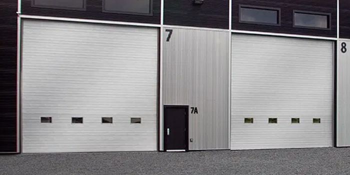 fix bent garage door in Kanata